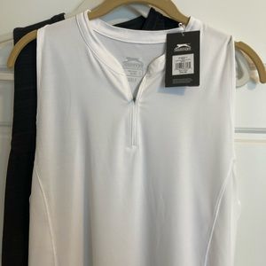 Slazenger white sleeveless golf shirt . Size L .